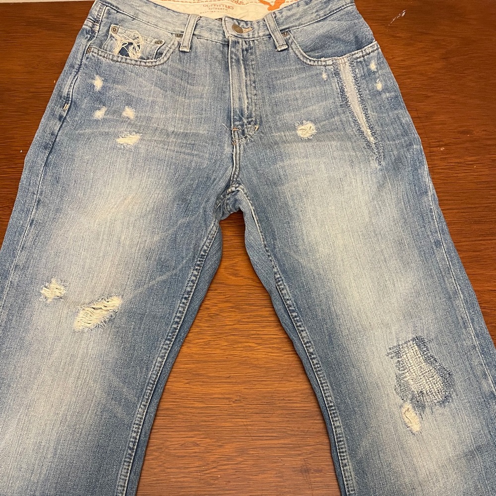 Boot cut distressed jeans AE- 28x28